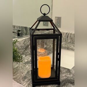 Kirklands Black Lantern with battery lit Candle.  L 6.5” X W 6.5” x H 15”